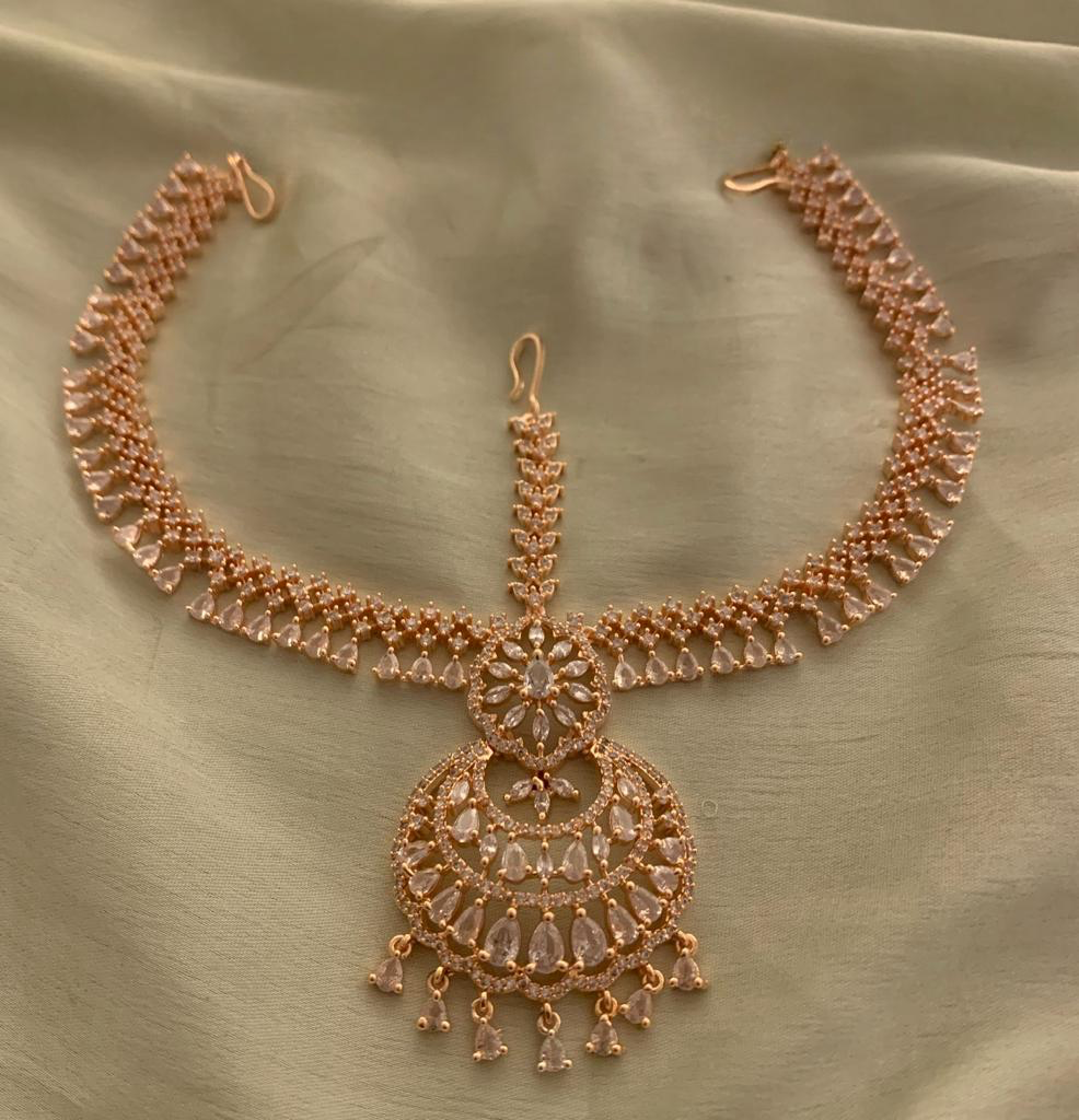 Elegant Bridal RoseGold Finish AD Stone Mathpati Tikkas