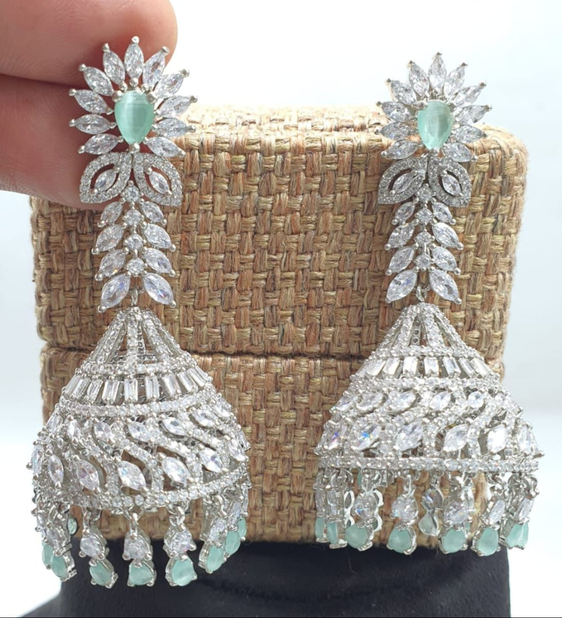 Elegant Revolving CZ Stone Jhumka Earrings - Silver Finish