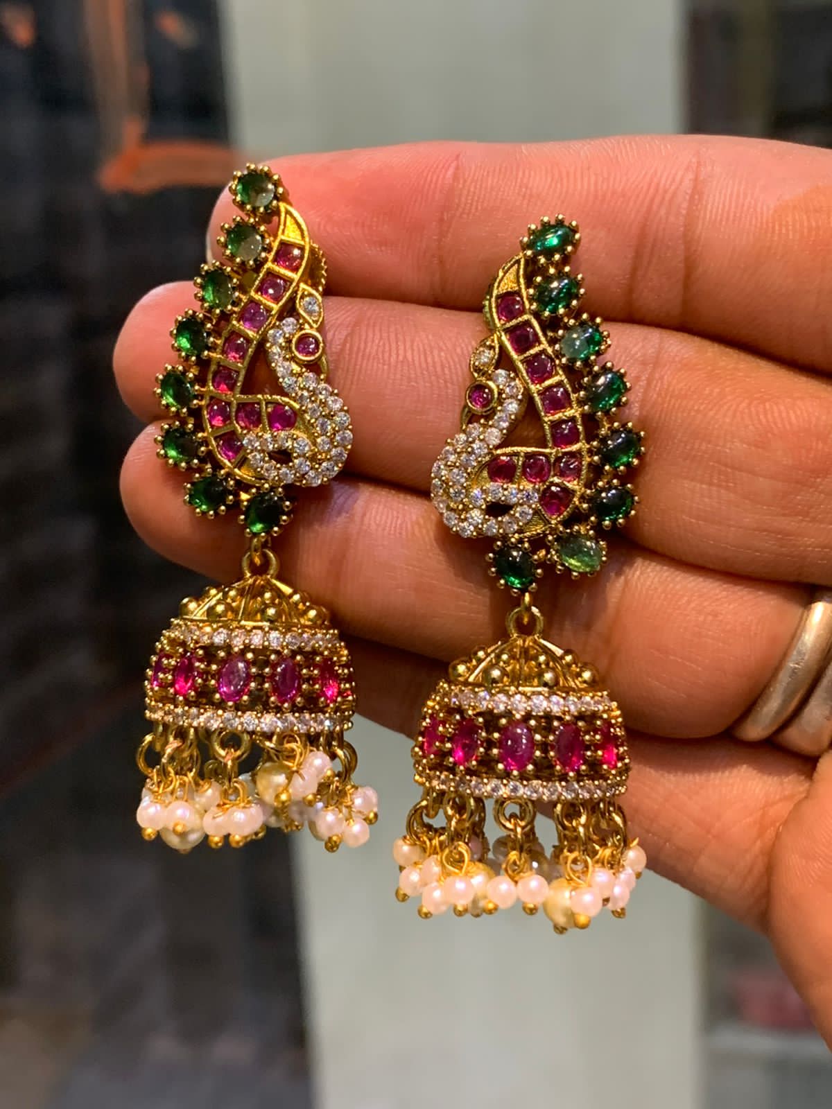 Premium Antique Finish Jhumka Earrings With Pearl Drops - Peacock Motif