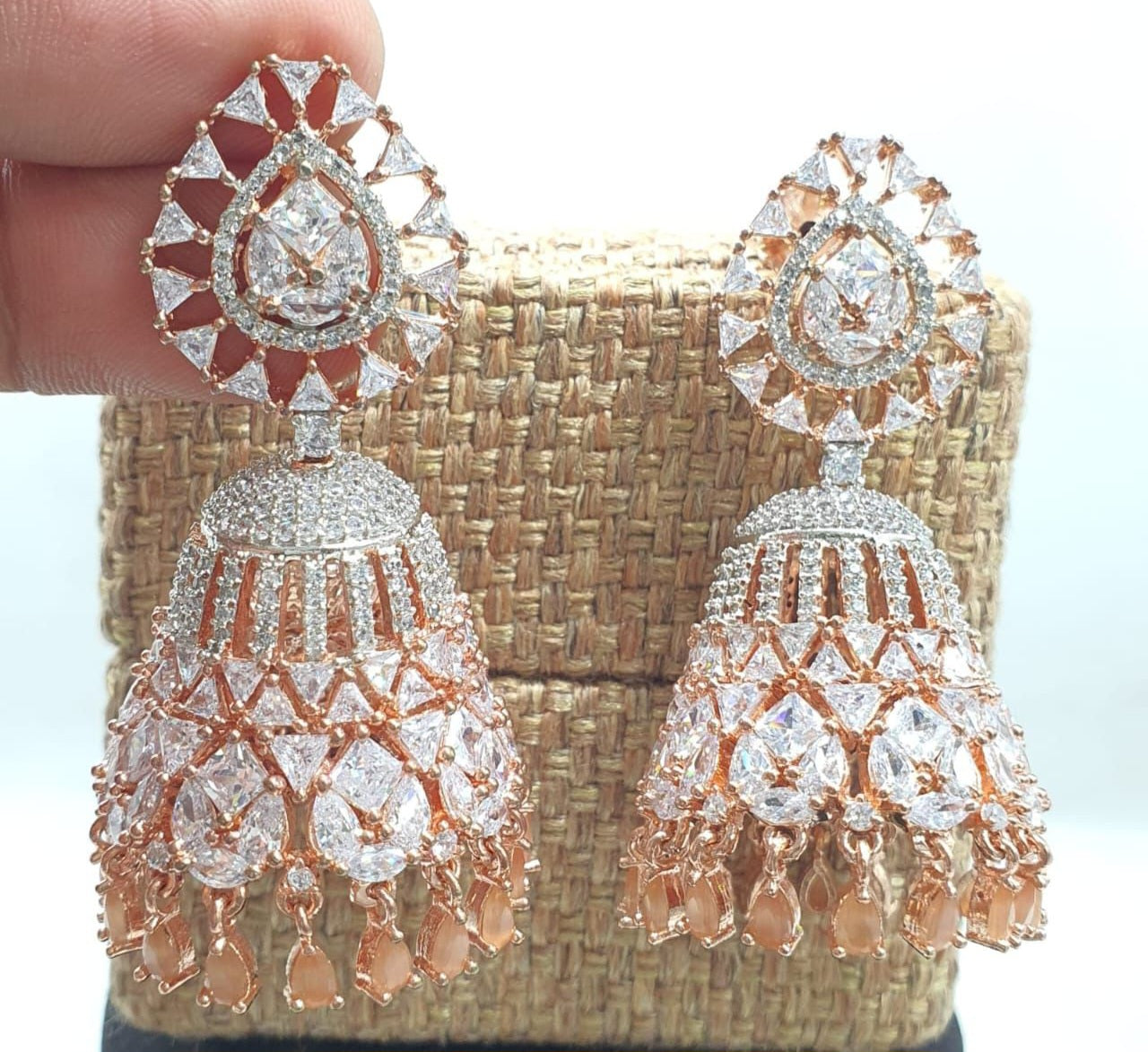 Trending Premium CZ Stone Jhumkas Earrings - Rose Gold