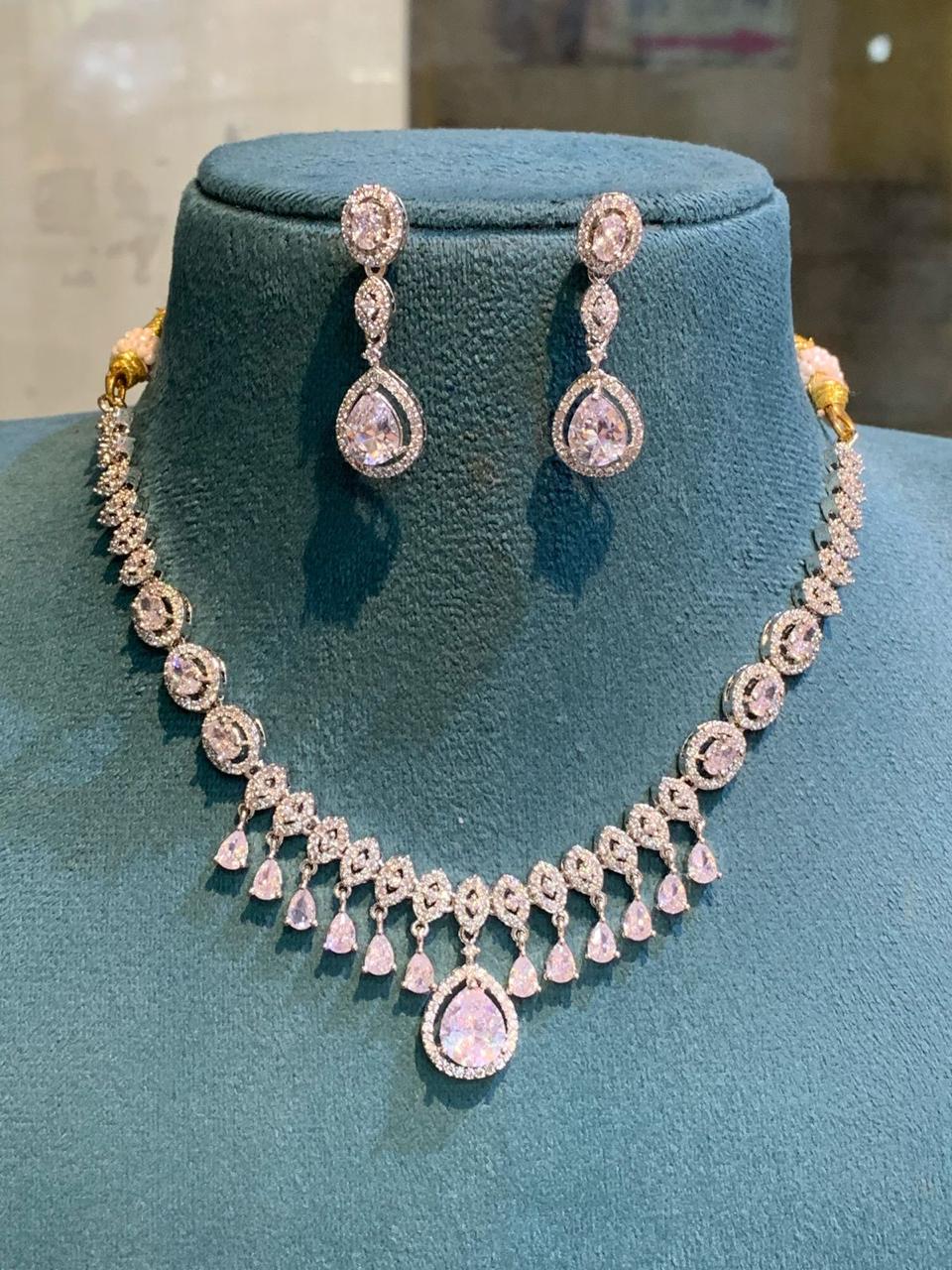 Exquisitely Designed American Diamond Stone Necklace Set With Earrings