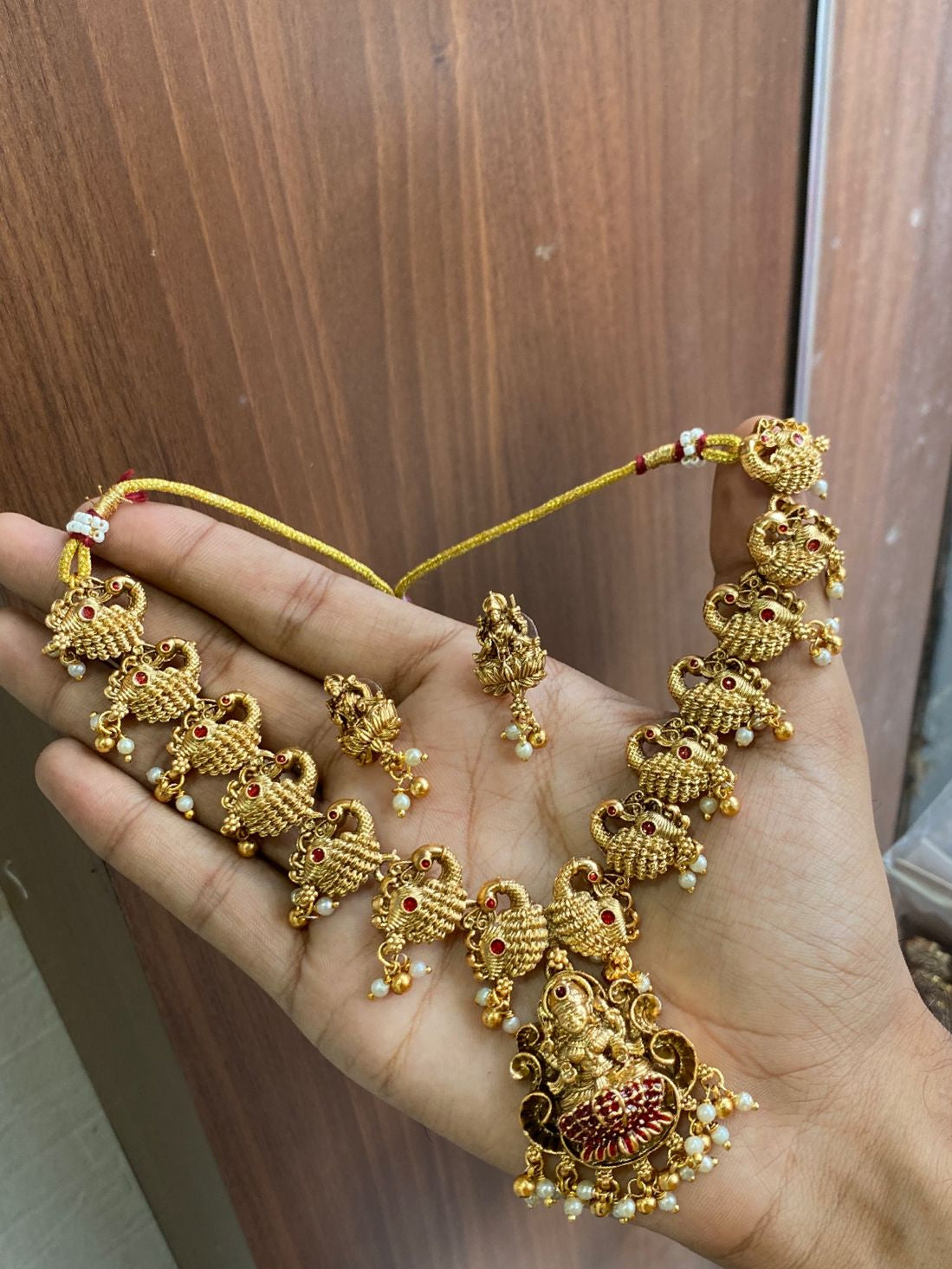 Antique Gold Finish Lakshmi Pendant Temple Jewelry Set With Earrings - Peacock Motifs