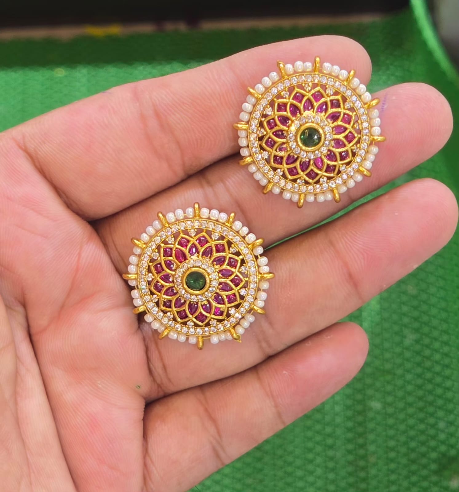 Elegant Matte Finish Navaratna Floral Stud Earrings - Red & Green