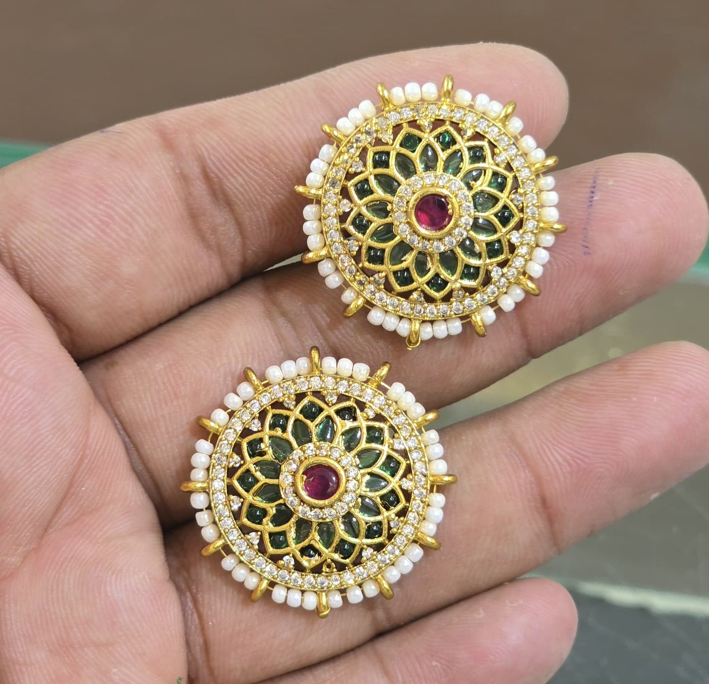 Elegant Matte Finish Navaratna Floral Stud Earrings - Red & Green