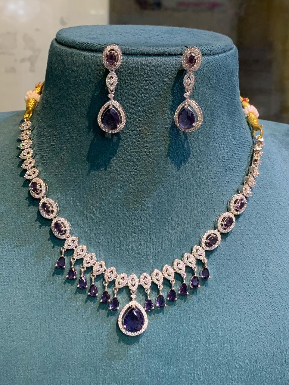 Exquisitely Designed American Diamond Stone Necklace Set With Earrings