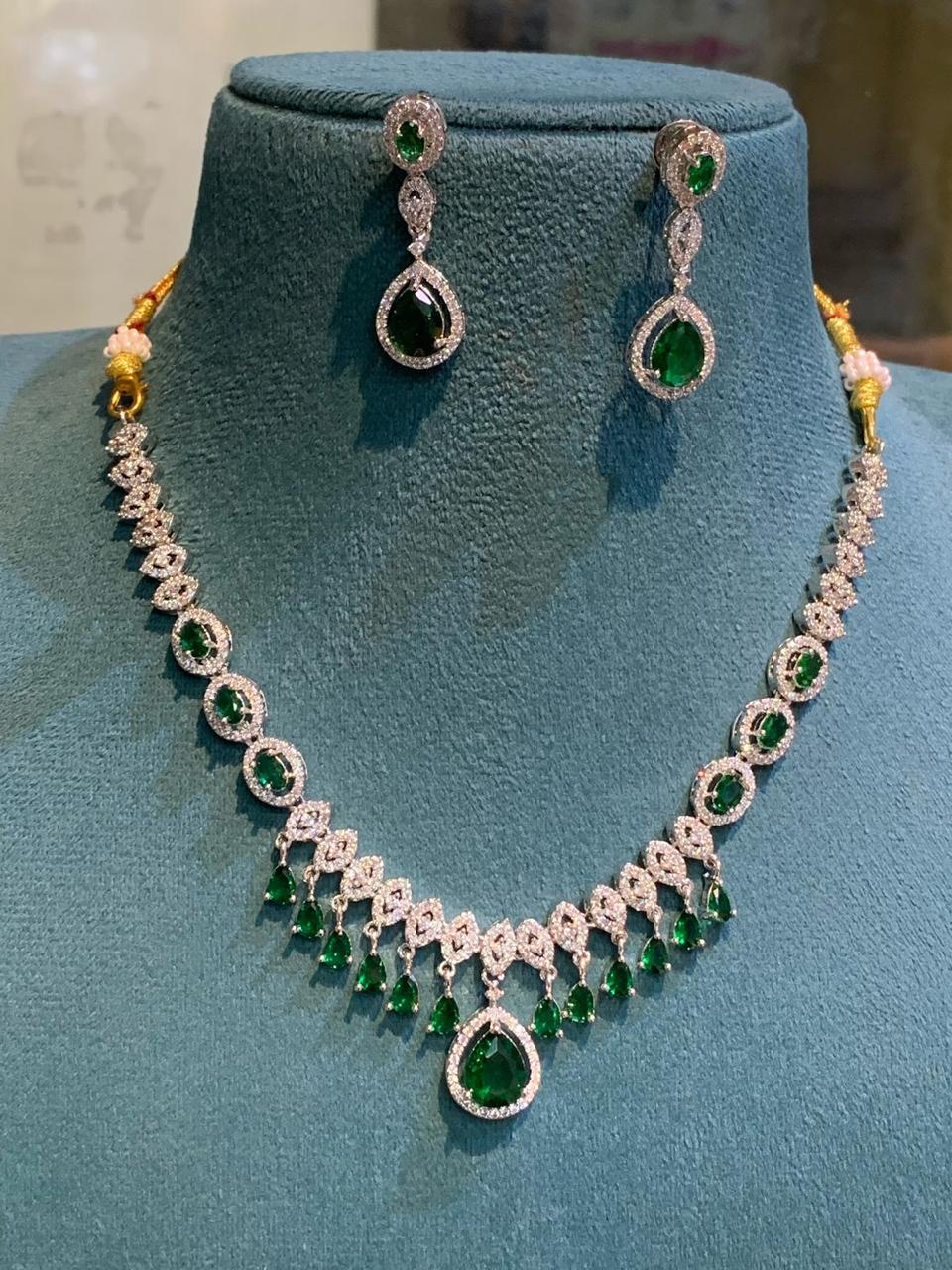 Exquisitely Designed American Diamond Stone Necklace Set With Earrings