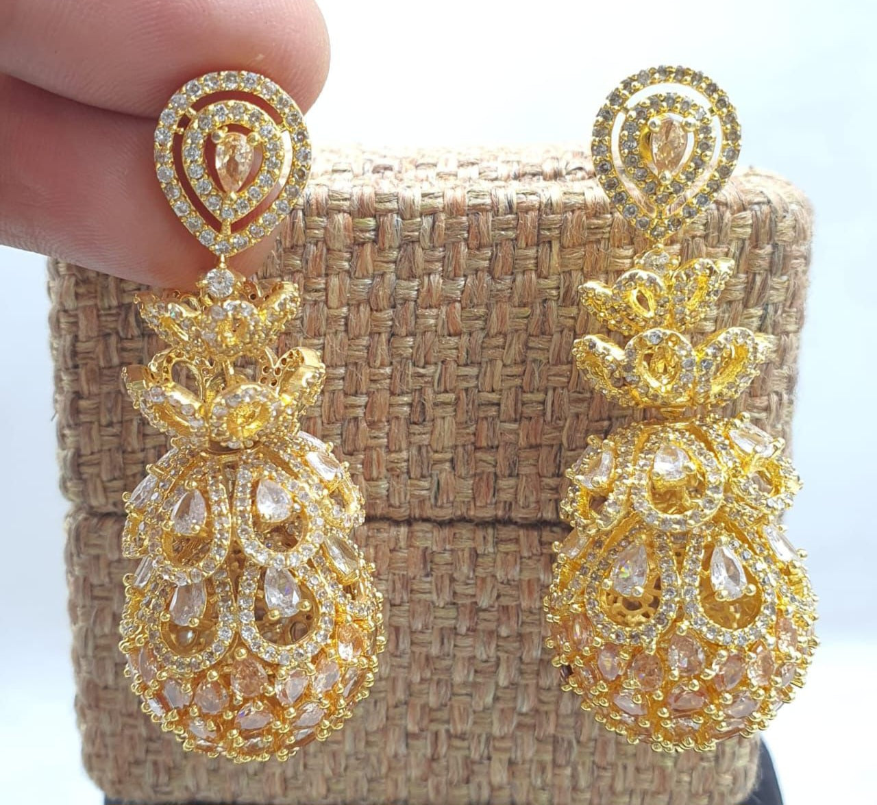 Party Wear Dazzling Golden American Diamond Stone Jhumka Earrings