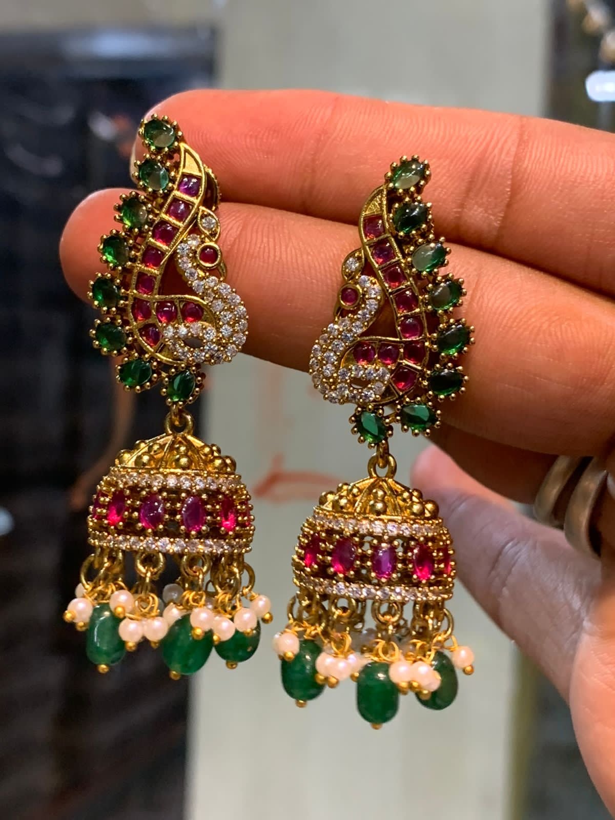 Premium Antique Finish Jhumka Earrings With Pearl Drops - Peacock Motif