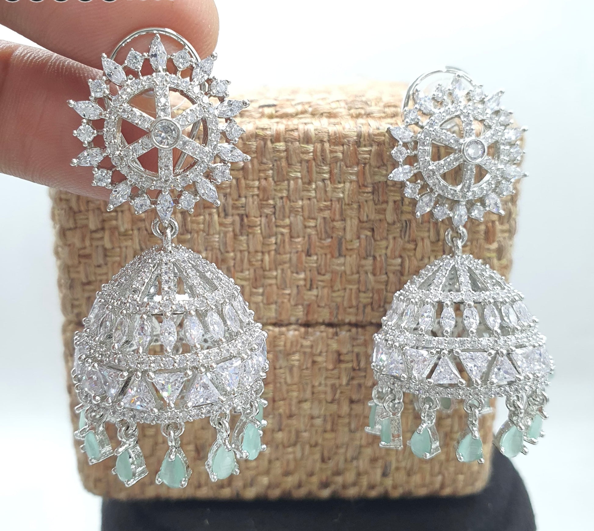 Premium Silver Polish CZ Stone Jhumkas Earrings