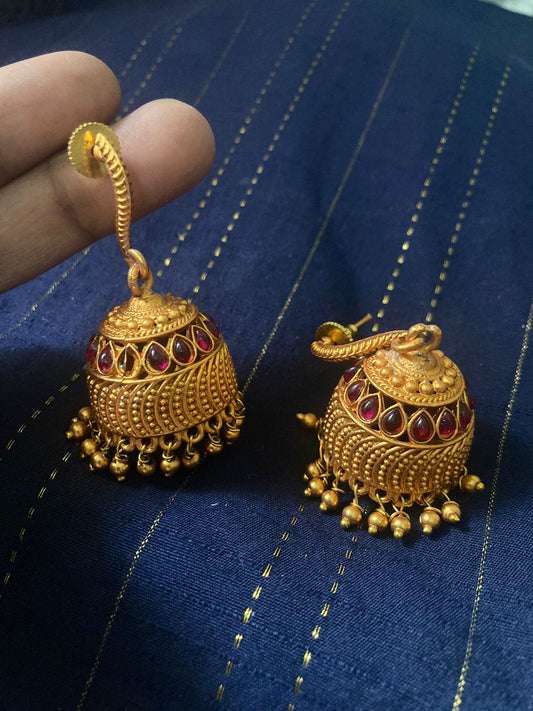 Traditional Antique Gold Plated Jhumka Earrings with Red Stones