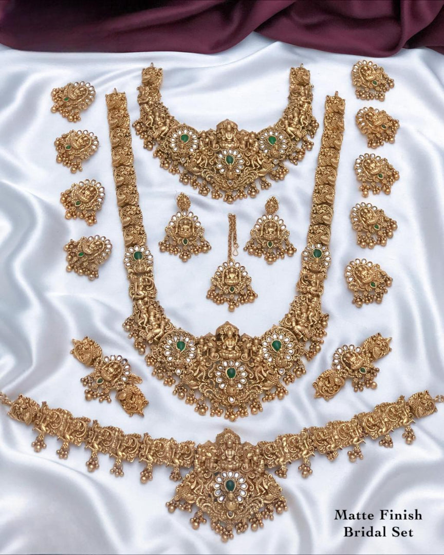 Traditional  Matte Finish Bridal Set With Green Stone & Pearl Drops - Lakshmi Motif