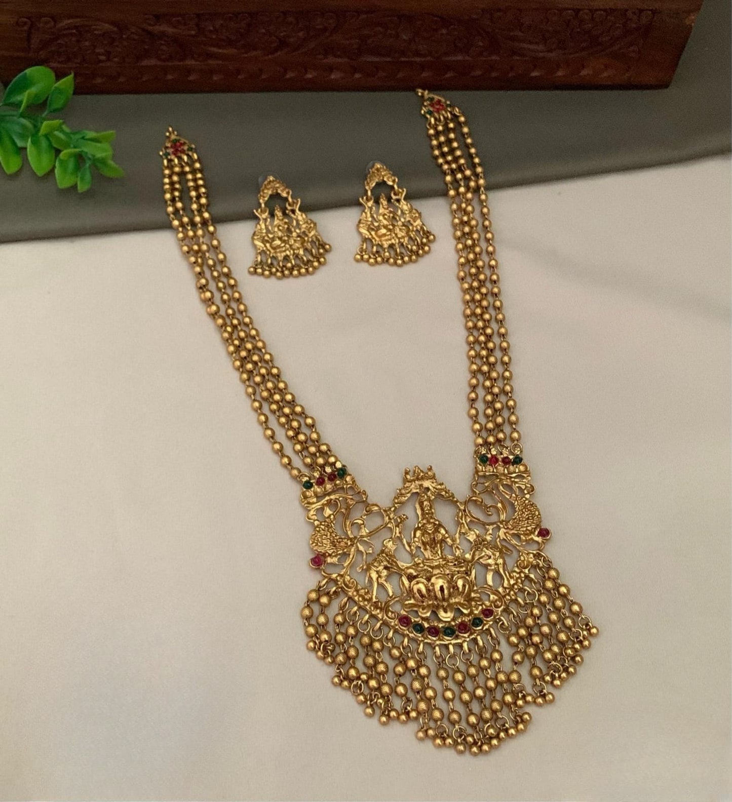 Trendy Matte Temple Jewelry Lakshmi Haram Long Necklace Set With Earrings