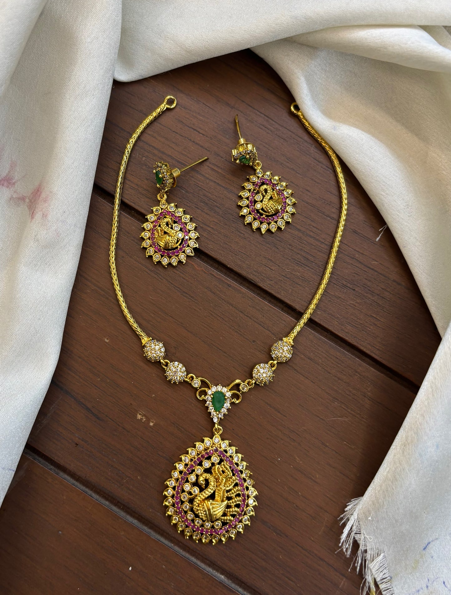Premium Matte Finish Cz Stone Minimalist Necklace and Earrings - Peacock Motif