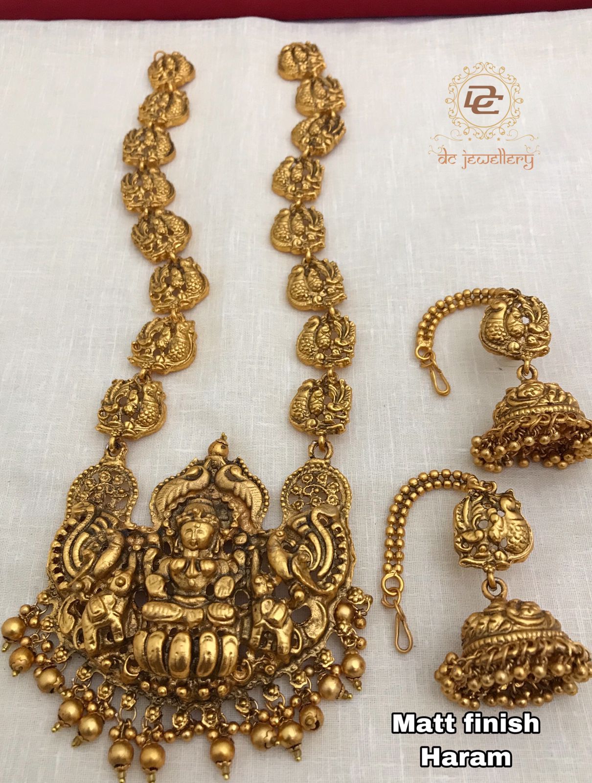 Trendy Matte Temple Jewelry Haram Long Necklace Set with Jhumkas and Matal